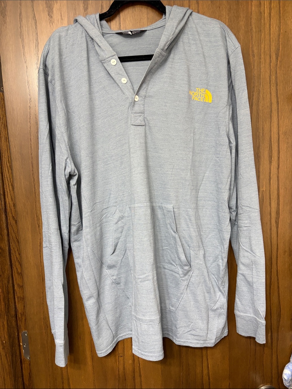 The North Face Men’s Light Gray Hooded Pullover with Yellow Logo